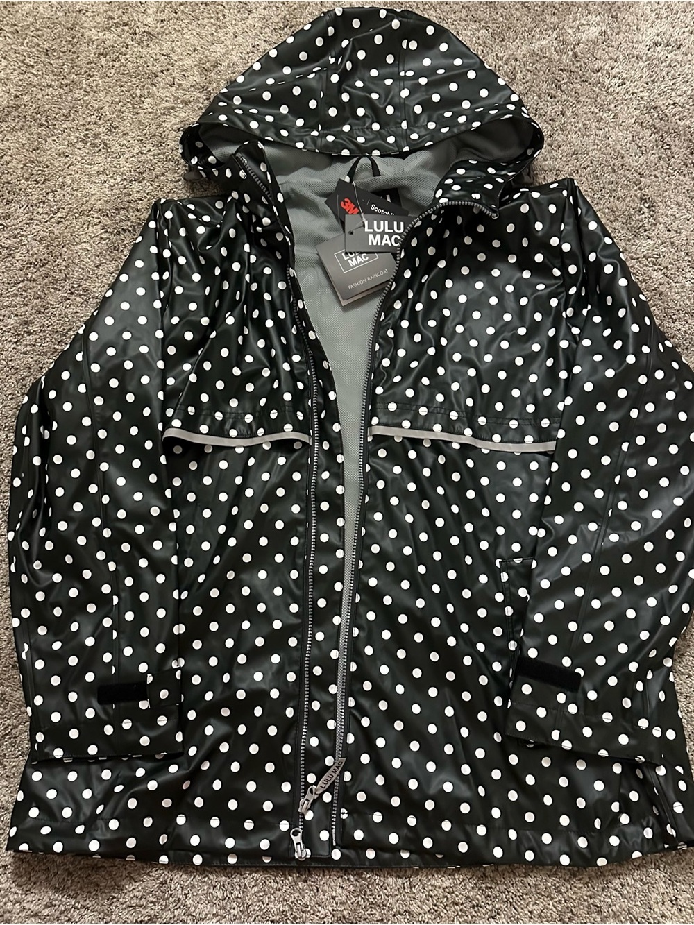 Lulu Mac polka dot hooded rain jacket in black/white